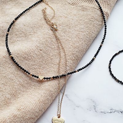 Smulkus vėrinys su grandinėle